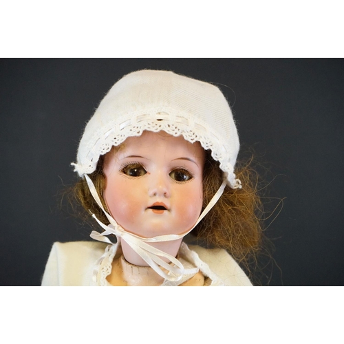 409 - Three early 20th C dolls to include Armand Marseille with sleeping brown glass eyes, marked 390 A2/0... 