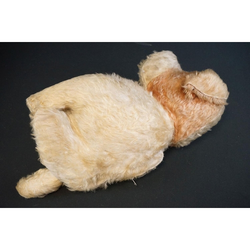 411 - Three vintage soft toys to include straw filled dog with zipper back, hand puppet and another