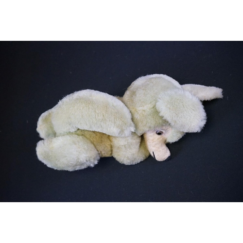 411 - Three vintage soft toys to include straw filled dog with zipper back, hand puppet and another