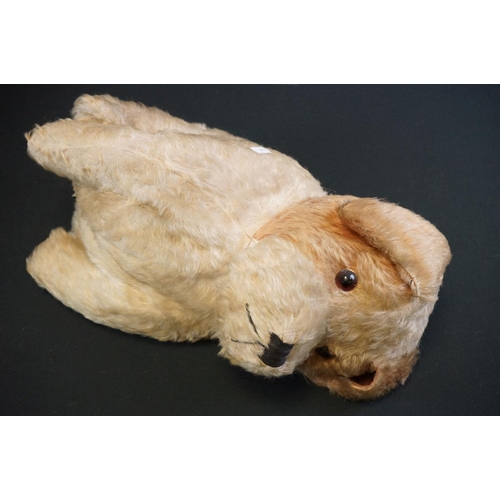 411 - Three vintage soft toys to include straw filled dog with zipper back, hand puppet and another