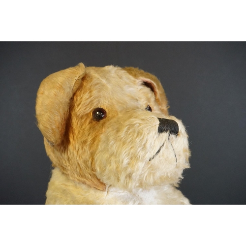 411 - Three vintage soft toys to include straw filled dog with zipper back, hand puppet and another