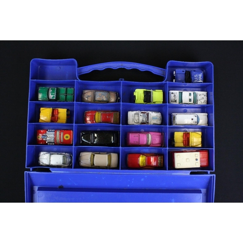 1104 - Three Matchbox 1980s plastic carry cases containing 63 diecast models, mostly Matchbox examples, fea... 