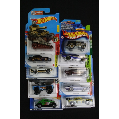 1113 - Around 70 carded Mattel Hot Wheels diecast models to include a set of 8 x Star Wars models, ex