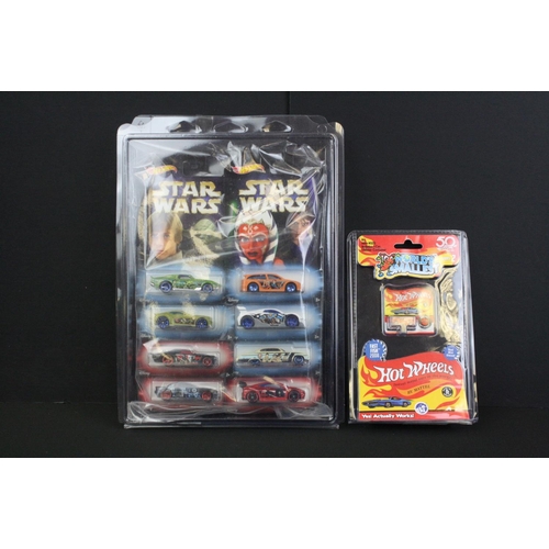 1113 - Around 70 carded Mattel Hot Wheels diecast models to include a set of 8 x Star Wars models, ex