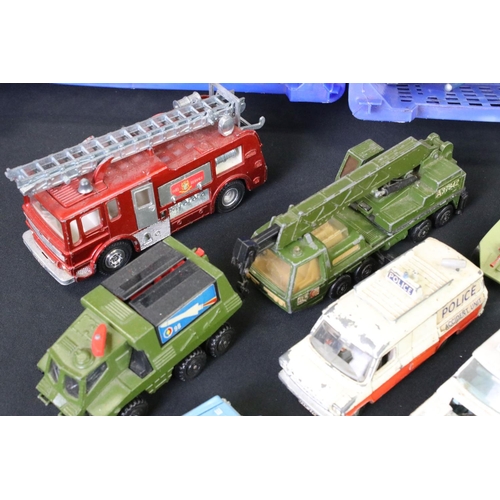 1274 - Around 25 mid 20th C play worn emergency service and space vehicles to include Matchbox, Corgi and D... 