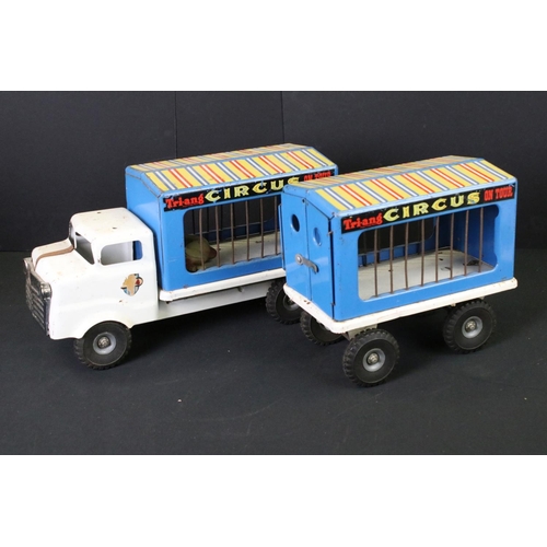 287 - Five Triang tinplate vehicles to include circus truck, circus trailer (with one plastic camel), tipp... 