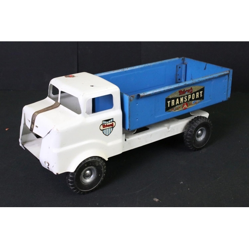 287 - Five Triang tinplate vehicles to include circus truck, circus trailer (with one plastic camel), tipp... 