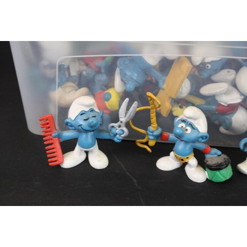 399 - Around 70 original Schleich Smurfs figures plus accessories and a group of flatpacked boxes and 5 x ... 