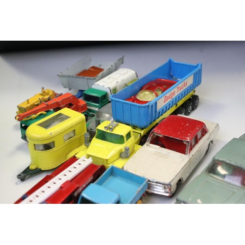 1276A - Around 60 mid 20th C onwards play worn diecast models to include Triang Spot-On, Corgi, Matchbox and... 