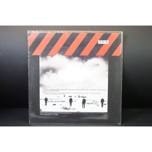 493 - Vinyl - U2 3 albums to include: How To Dismantle An Atomic Bomb (UK 2004, printed inner and 16 page ... 