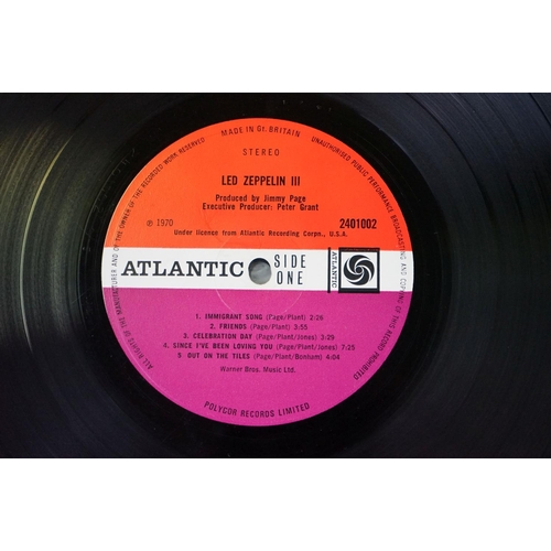 50 - Vinyl - 4 Led Zeppelin UK pressing albums to include Self Titled (UK 2nd pressing plum labels, Warne... 