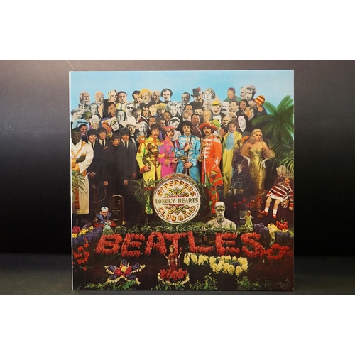 904 - Vinyl - 10 The Beatles LPs to include Abbey Road (misaligned Apple), Sgt Pepper (with cut outs), Rev... 