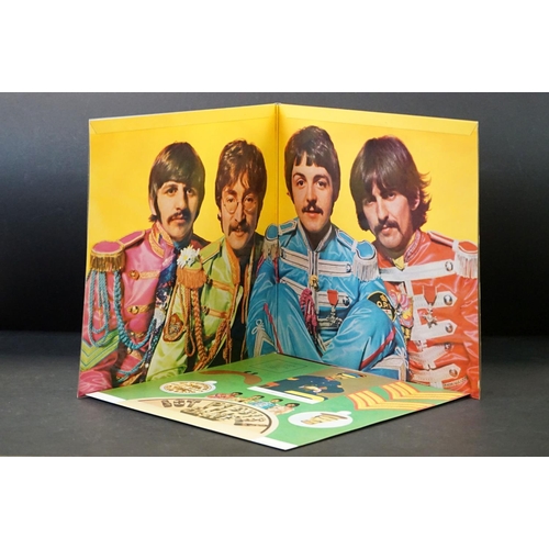 904 - Vinyl - 10 The Beatles LPs to include Abbey Road (misaligned Apple), Sgt Pepper (with cut outs), Rev... 