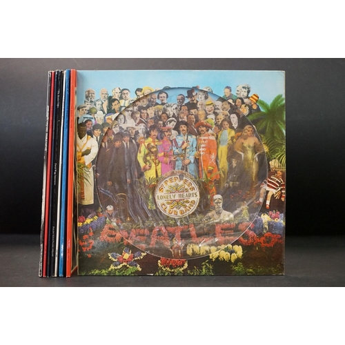 942 - Vinyl - 8 The Beatles LPs to include Sgt Pepper (W. German press pic disc), 1962-1966 (Gold stamp pr... 