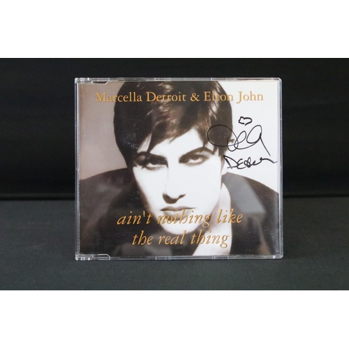 1139A - CDs & Autographs - Elton John The Duets Collection 16 single box set.  Some of 16 signed in sharpie ... 