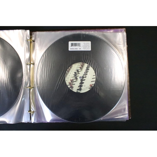 49A - Vinyl – Aphex Twin AFX Analord Series with binder.  Includes all 11 records in the binder.  Also inc... 