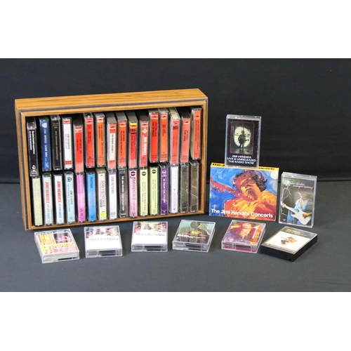 1142 - Cassettes – Approx 40 Jimi Hendrix cassettes spanning his career in a vintage storage box