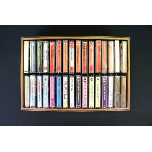 1142 - Cassettes – Approx 40 Jimi Hendrix cassettes spanning his career in a vintage storage box