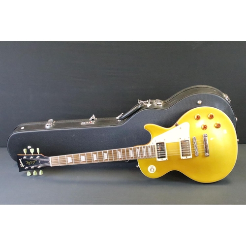 1153 - Guitar - A Les Paul style 'gold top' electric guitar with Gibson decals.  Comes with hard case