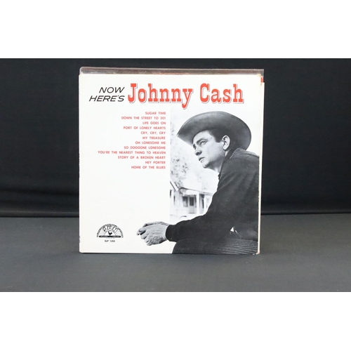 887 - Vinyl - Approx 50 Johnny Cash LPs spanning his career.  Condition varies