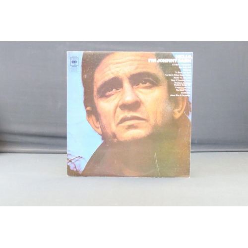 887 - Vinyl - Approx 50 Johnny Cash LPs spanning his career.  Condition varies