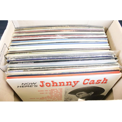 887 - Vinyl - Approx 50 Johnny Cash LPs spanning his career.  Condition varies