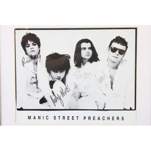 1101 - Memorabilia & Autographs - Manic Street Preachers framed and glazed pictures signed to front by all ... 