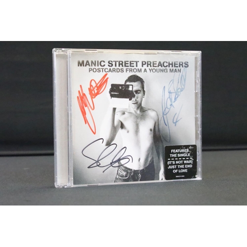 1101 - Memorabilia & Autographs - Manic Street Preachers framed and glazed pictures signed to front by all ... 