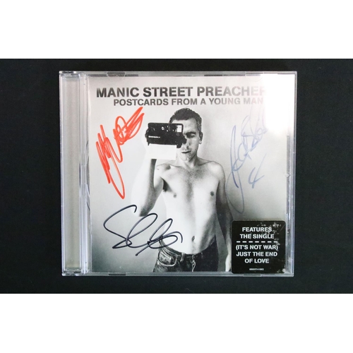 1101 - Memorabilia & Autographs - Manic Street Preachers framed and glazed pictures signed to front by all ... 