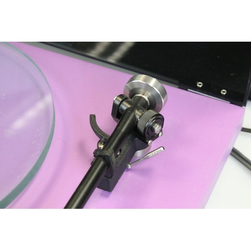 1147 - Audio Equipment - A Rega Plana 3 turntable in purple finish