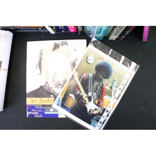 1111 - Memorabilia - Approx 25 books related to Jimi Hendrix including hardback and paperbacks, along with ... 