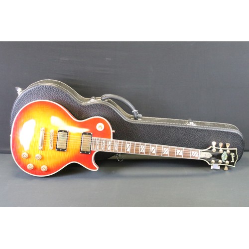 1151 - Guitar - A Chinese made Les Paul Supreme style guitar with Gibson decals.  Comes with hard case