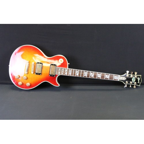 1151 - Guitar - A Chinese made Les Paul Supreme style guitar with Gibson decals.  Comes with hard case