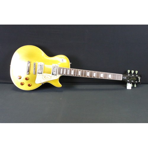 1152 - Guitar - A Les Paul style 'gold top' electric guitar with Gibson Decals.  Comes with hard case