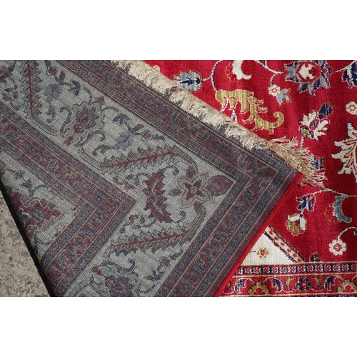 636 - Red Ground Full Pile Cashmere Carpet with medallion design, 300cmm x 200cm