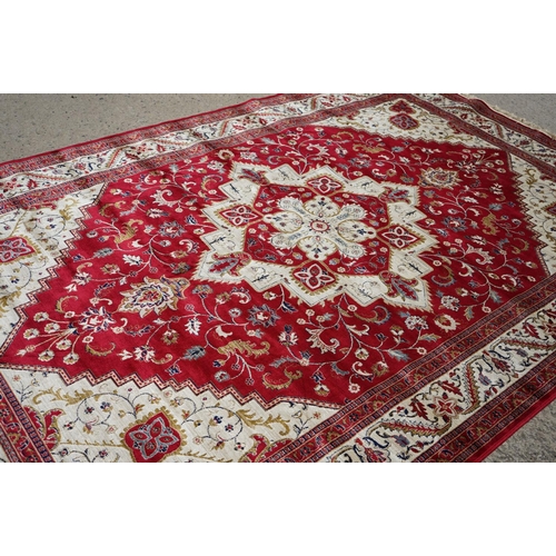 636 - Red Ground Full Pile Cashmere Carpet with medallion design, 300cmm x 200cm