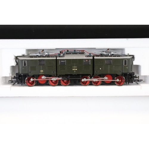 56 - Three boxed Roco HO gauge locomotives to include 43737 DRG E91 88, 43240 DB and a 2-10-0 DB with ten... 