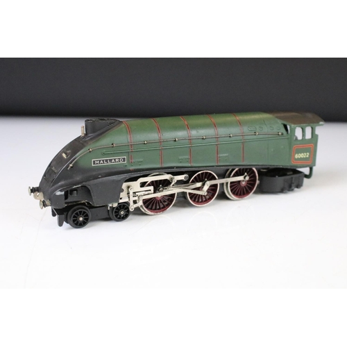 75 - Two boxed Trix OO gauge locomotives to include Flying Scotsman and Mallard plus a boxed Triang Wrenn... 