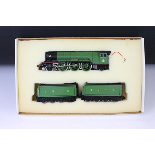 75 - Two boxed Trix OO gauge locomotives to include Flying Scotsman and Mallard plus a boxed Triang Wrenn... 