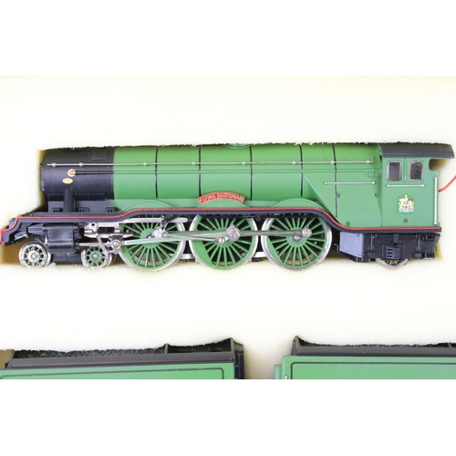 75 - Two boxed Trix OO gauge locomotives to include Flying Scotsman and Mallard plus a boxed Triang Wrenn... 