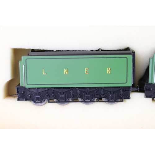 75 - Two boxed Trix OO gauge locomotives to include Flying Scotsman and Mallard plus a boxed Triang Wrenn... 