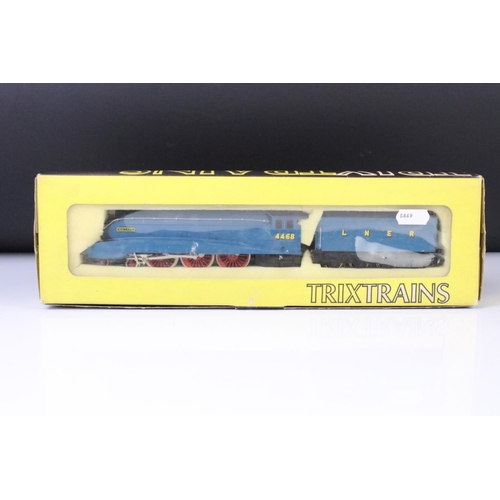 75 - Two boxed Trix OO gauge locomotives to include Flying Scotsman and Mallard plus a boxed Triang Wrenn... 