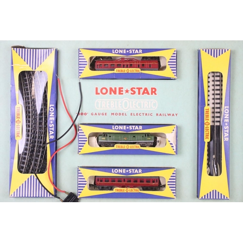 81 - Boxed Lone Star Treble OOO gauge train set complete with locomotive, 2 x rolling stock and track, wi... 