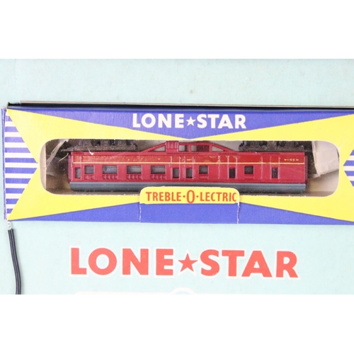 81 - Boxed Lone Star Treble OOO gauge train set complete with locomotive, 2 x rolling stock and track, wi... 