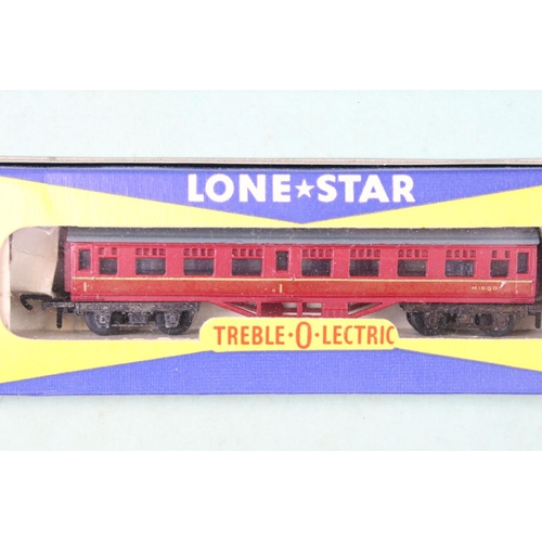 81 - Boxed Lone Star Treble OOO gauge train set complete with locomotive, 2 x rolling stock and track, wi... 