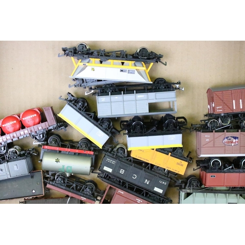 111 - Around 80 OO gauge items of rolling stock to include mainly Triang & Hornby examples featuring wagon... 