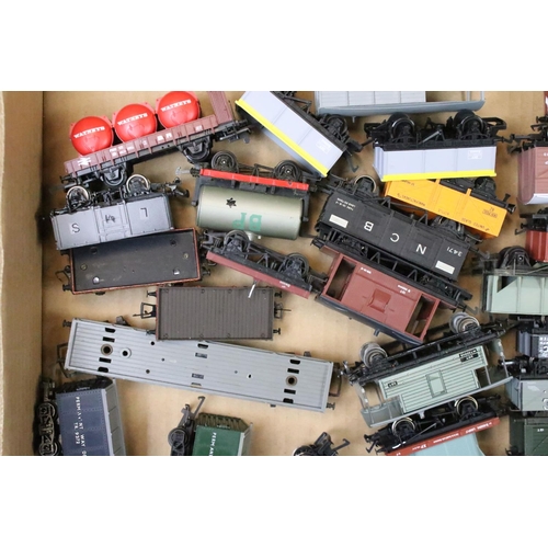 111 - Around 80 OO gauge items of rolling stock to include mainly Triang & Hornby examples featuring wagon... 