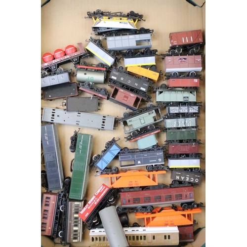 111 - Around 80 OO gauge items of rolling stock to include mainly Triang & Hornby examples featuring wagon... 