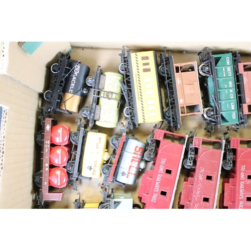 111 - Around 80 OO gauge items of rolling stock to include mainly Triang & Hornby examples featuring wagon... 