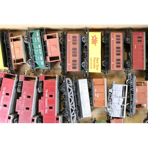 111 - Around 80 OO gauge items of rolling stock to include mainly Triang & Hornby examples featuring wagon... 